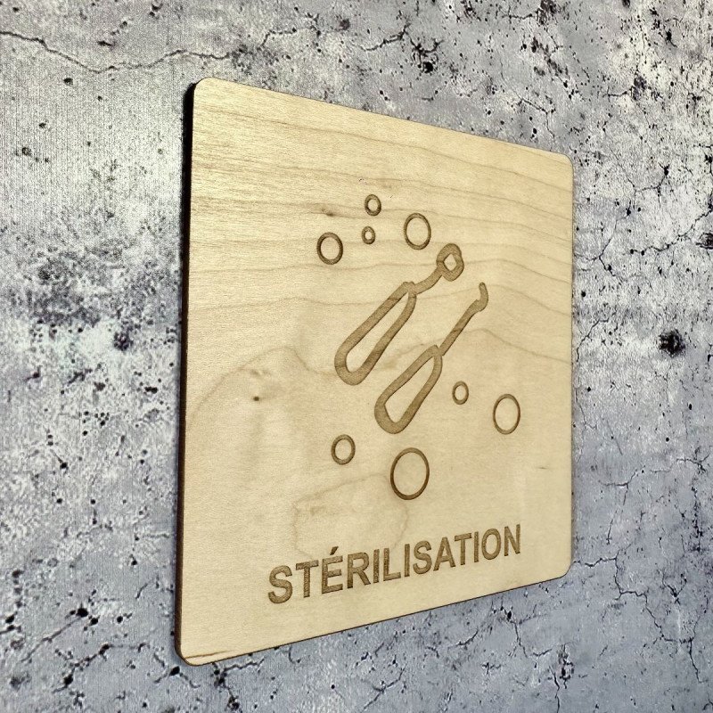 Plaque en bois gravée stérilisation pour les dentistes