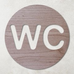 Plaque ronde en bois avec pictogramme WC évidé