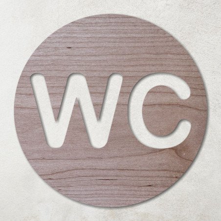 Plaque ronde en bois avec pictogramme WC évidé